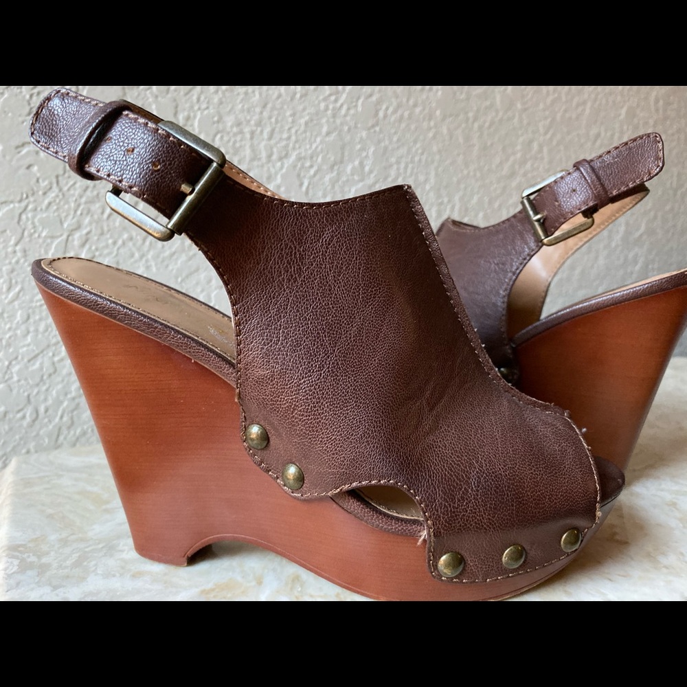 Leather high heeled clogs by Nine West